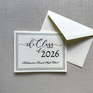 Graduation announcement card with green foil design for 'the Class of 2026' and an envelope on a gray textured background.