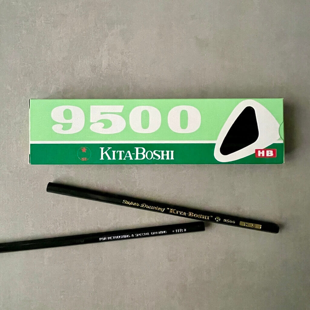 Kita-Boshi 9500 pencil set with two pencils on a gray background