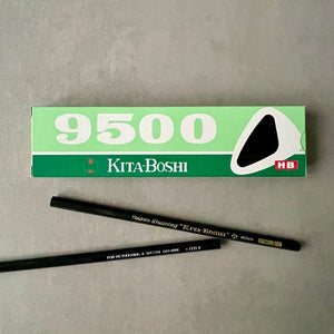 Kita-Boshi 9500 pencil set with two pencils on a gray background