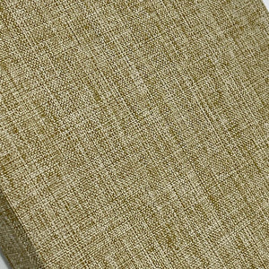 Close-up of textured beige fabric with a subtle pattern
