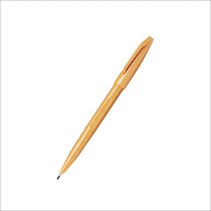 Gold pen on a white background