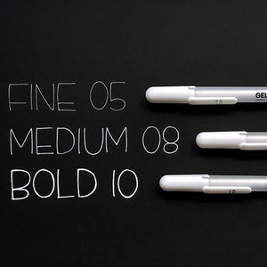 Three Gelly Roll white pens with different line widths on a black background