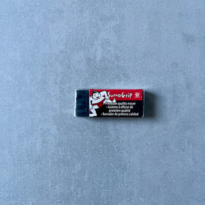 SumoGrip block eraser on a gray background