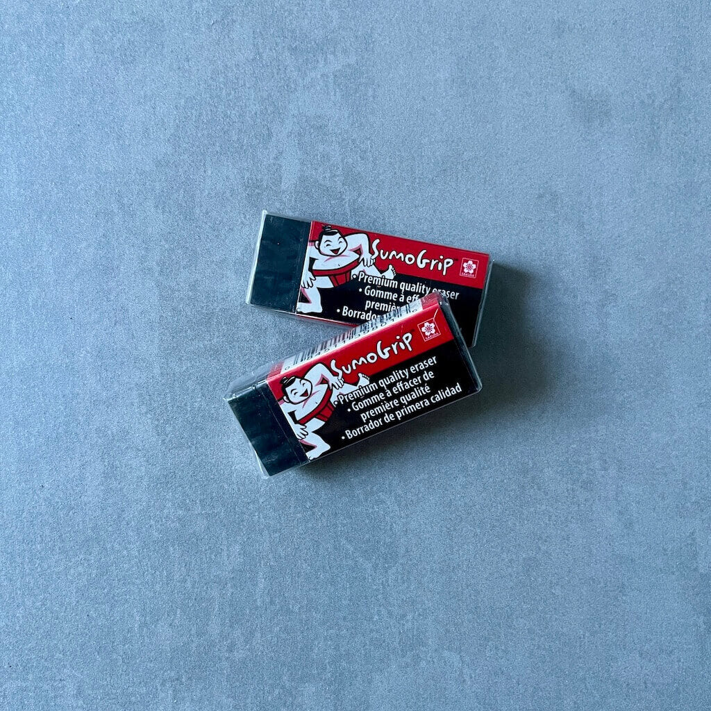 SumoGrip block eraser on a gray background